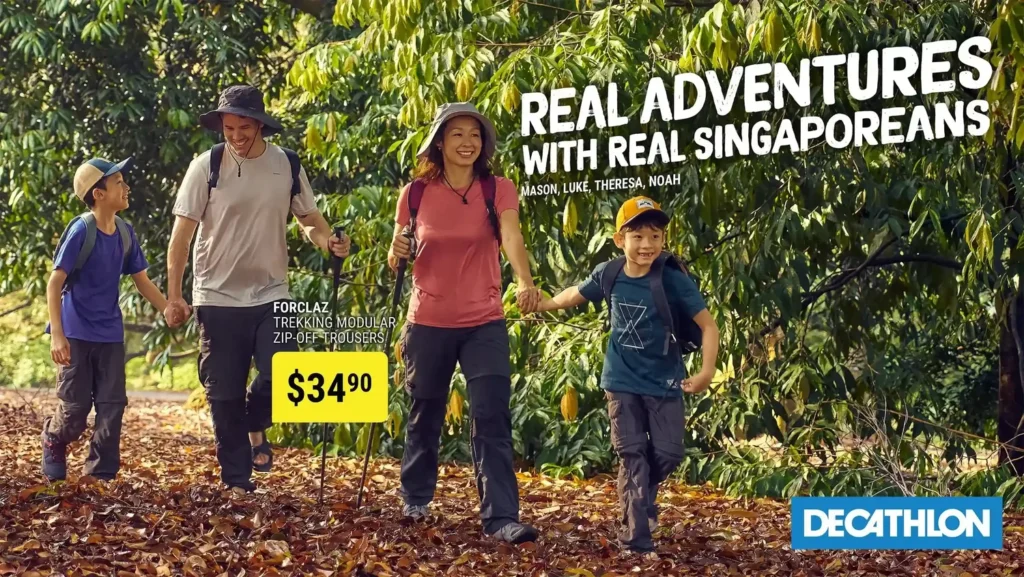 Family of four adventuring in the forest during summer